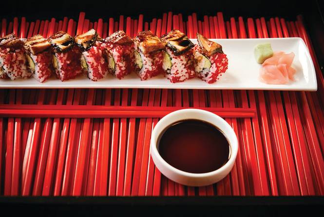 Red Ginger signature dishes Minced Chicken in Lettuce Wraps, Artisan Sushi (variety), Crispy Vietnamese Spring Rolls, Chinese Style Ribs.